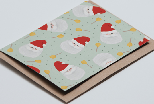 Jingle all the way - A playful christmas card with santa faces and bells